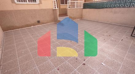 Spacious Ground Floor Two-Bedroom Apartment with Community Pool and Terraces