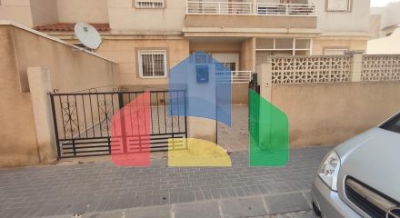 Spacious Ground Floor Two-Bedroom Apartment with Community Pool and Terraces