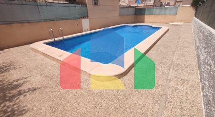 Spacious Ground Floor Two-Bedroom Apartment with Community Pool and Terraces