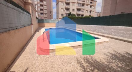 Spacious Ground Floor Two-Bedroom Apartment with Community Pool and Terraces