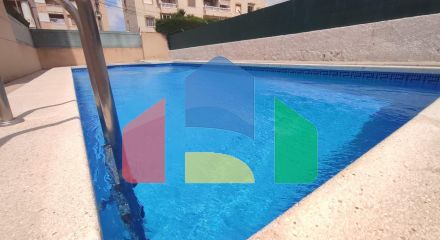 Spacious Ground Floor Two-Bedroom Apartment with Community Pool and Terraces