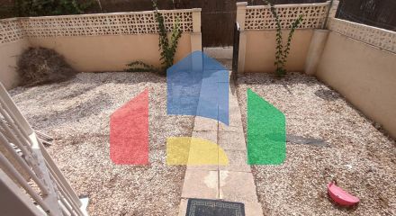 Spacious Ground Floor Two-Bedroom Apartment with Community Pool and Terraces