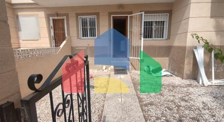 Spacious Ground Floor Two-Bedroom Apartment with Community Pool and Terraces