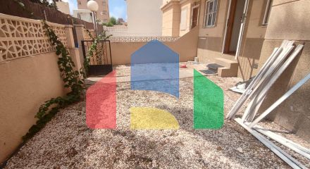Spacious Ground Floor Two-Bedroom Apartment with Community Pool and Terraces