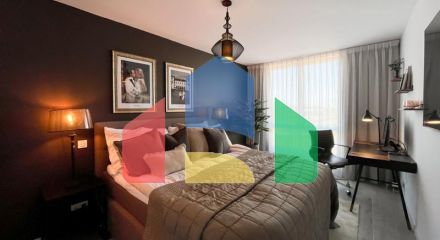 This beautifully situated Town House offers stunning views from its elevated position.