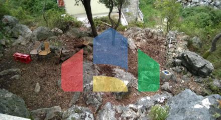 Plot of land above the highway, Ratac.