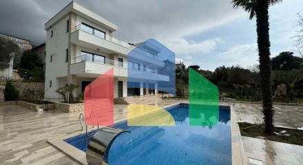 A new modern villa near the sea is offered for sale.