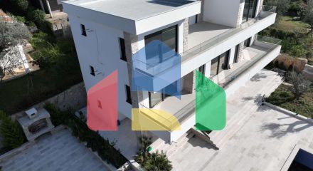 A new modern villa near the sea is offered for sale.