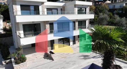 A new modern villa near the sea is offered for sale.