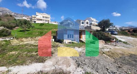 A plot with a house in Ivanovići, 905m²