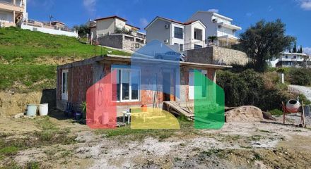 A plot with a house in Ivanovići, 905m²