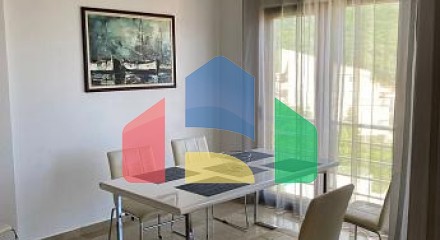 Spacious 107 sqm apartment with a terrace and sea view in the heart of Budva