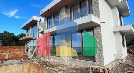 New villa with a pool and sea views in Dobra Voda.