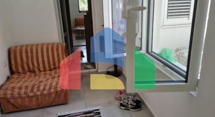 A house is offered for sale in Dobra Voda below the highway.