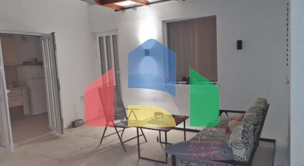A house is offered for sale in Dobra Voda below the highway.