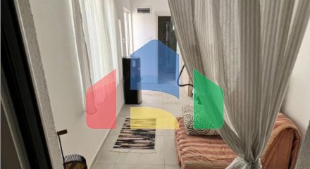A house is offered for sale in Dobra Voda below the highway.