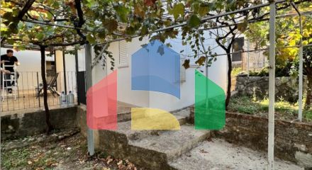 A house is offered for sale in Dobra Voda below the highway.