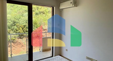 One bedroom apartment in a complex with a swimming pool