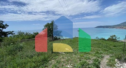 A fenced plot for sale with a panoramic view of the Adriatic Sea