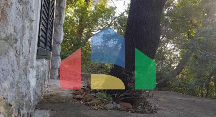 Plot of land with 3 objects