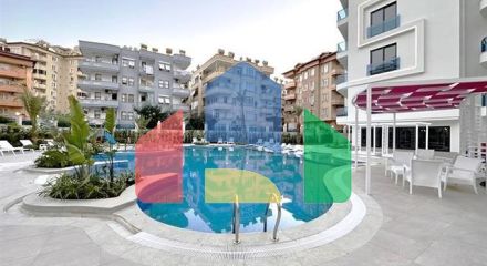 Сучасна квартира 1 + 1 в новому комплексі з видом на море в центрі Аланії