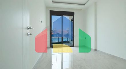 Сучасна квартира 1 + 1 в новому комплексі з видом на море в центрі Аланії