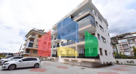 Просторий пентхаус з видом на море в центрі Аланії Просторий пентхаус з видом на море в центрі Аланії