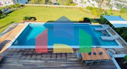 Стильна вілла з приголомшливим видом на море, гори і Бодрум.