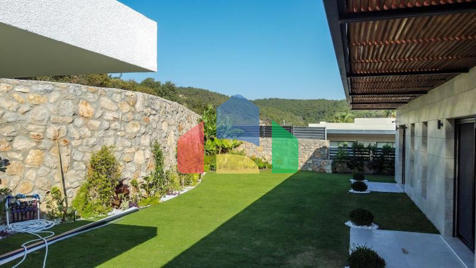 Вилла 7+2 с видом на море в Бодрум