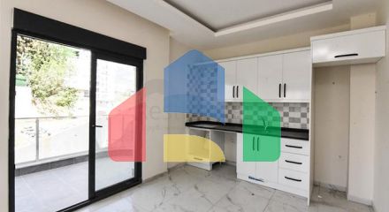 Квартира 1+1 в новом комплексе без инфраструктуры в районе Махмутлар