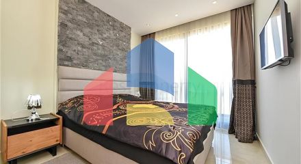 Квартира плануванням 2+1 на першій береговій лінії в Махмутлар