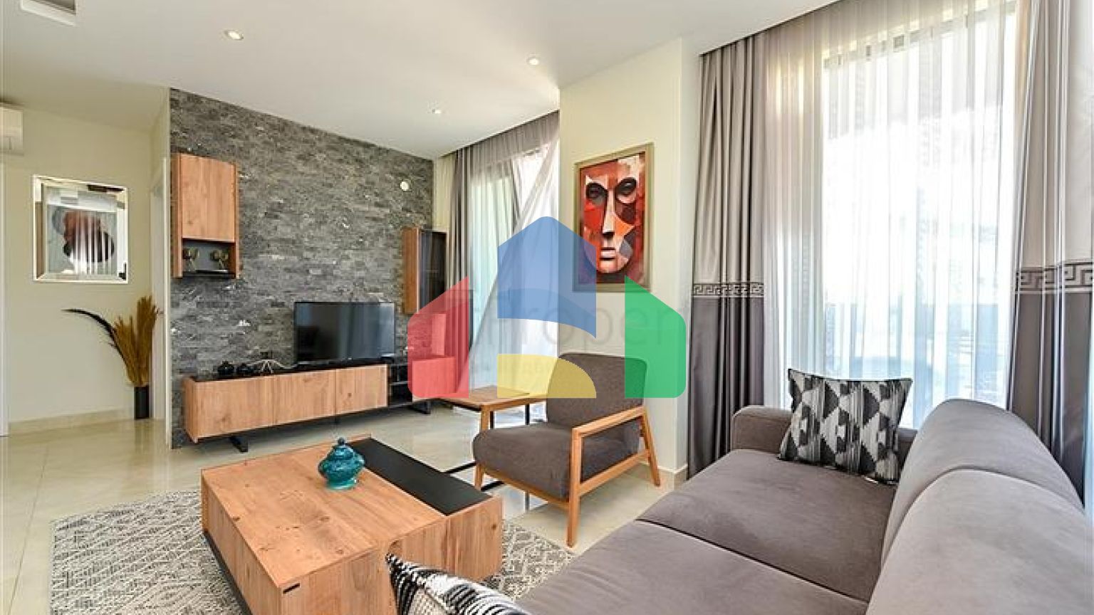 Квартира планировкой 2+1 на первой береговой линии в Махмутлар