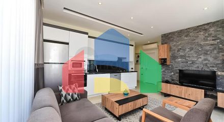 Квартира планировкой 2+1 на первой береговой линии в Махмутлар