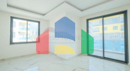 Квартира 1 + 1 в новому комплексі в районі Махмутлар