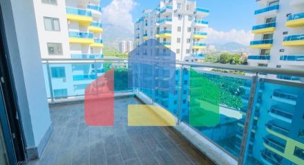 Квартира 1 + 1 в новому комплексі в районі Махмутлар