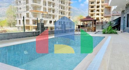 Продается квартира 1+1 в районе Махмутлар