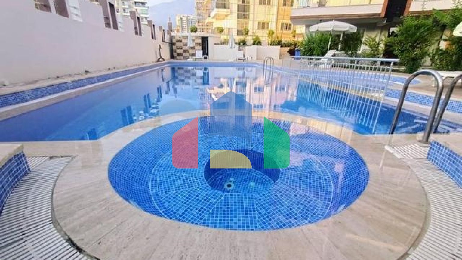 Квартира планировкой 2+1 в районе Махмутлар