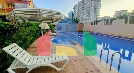 Квартира планировкой 2+1 в районе Махмутлар