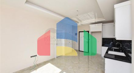 Квартира 1+1 с превосходной инфраструктурой в районе Махмутлар