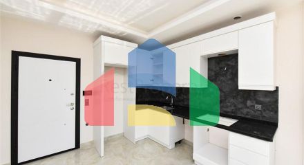 Квартира 1+1 с превосходной инфраструктурой в районе Махмутлар