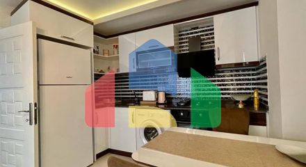 Затишна квартира 1 + 1 в районі Махмутлар