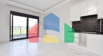 Квартира плануванням 1 + 1 в новому проекті в районі Махмутлар