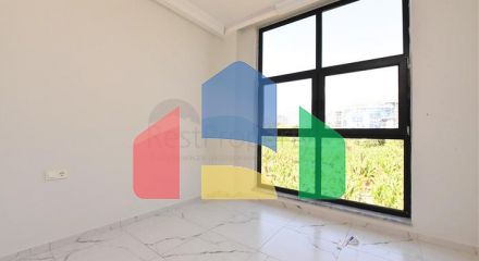 Квартира плануванням 1 + 1 в новому проекті в районі Махмутлар