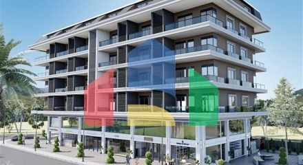 Квартира плануванням 1 + 1 в споруджуваному будинку району Махмутлар