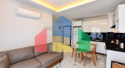 Квартира планировки 1+1 в новом комплексе в районе Махмутлар