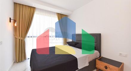 Квартира планировки 1+1 в новом комплексе в районе Махмутлар