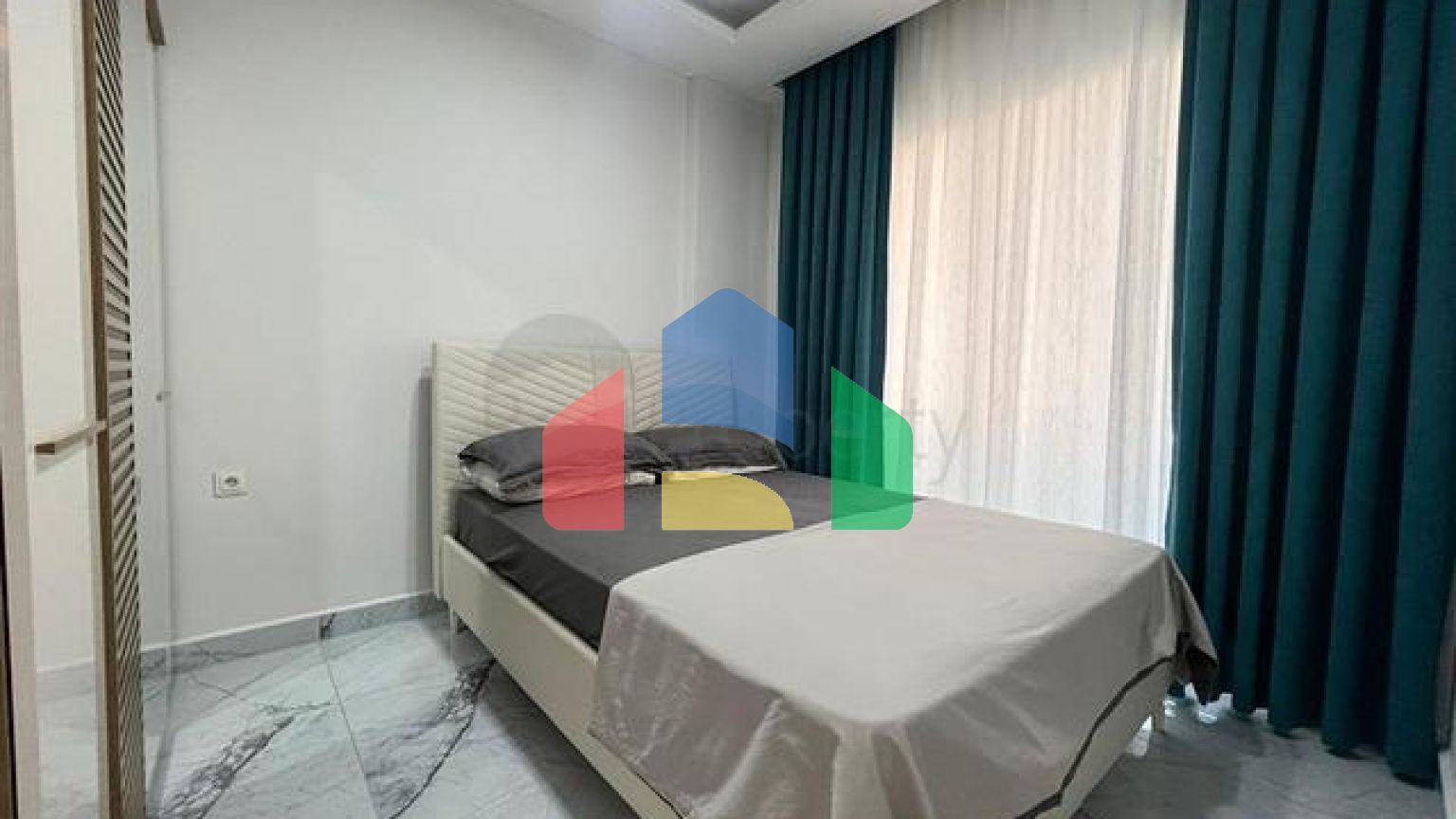 Нова стильна квартира плануванням 1 + 1 А районі Махмутлар