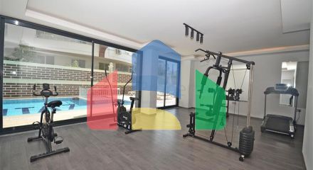 Трехкомнатная квартира в районе Махмутлар
