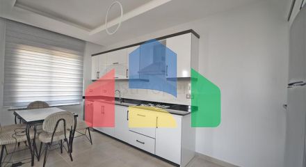 Трехкомнатная квартира в районе Махмутлар Трехкомнатная квартира в районе Махмутлар