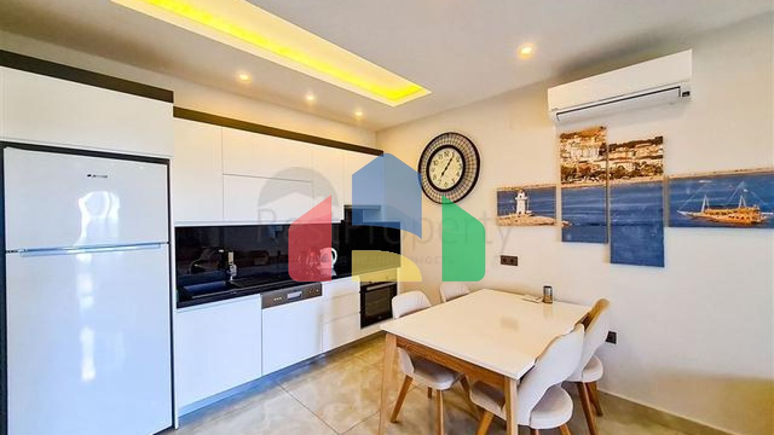 Квартира 1+1 на первой линии в районе Махмутлар